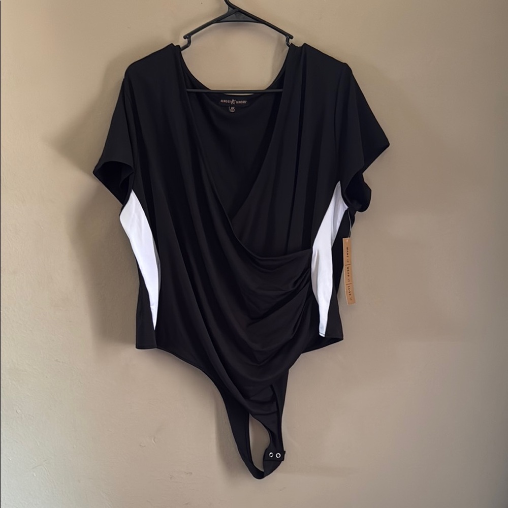 Almost Famous Black and White Asymmetrical Cap Sleeve Bodysuit
